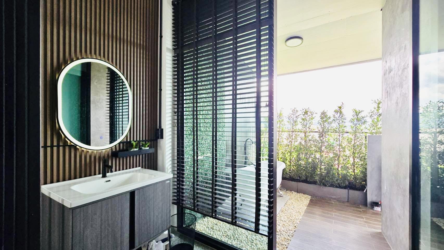 Bathroom vanity and outdoor bath area