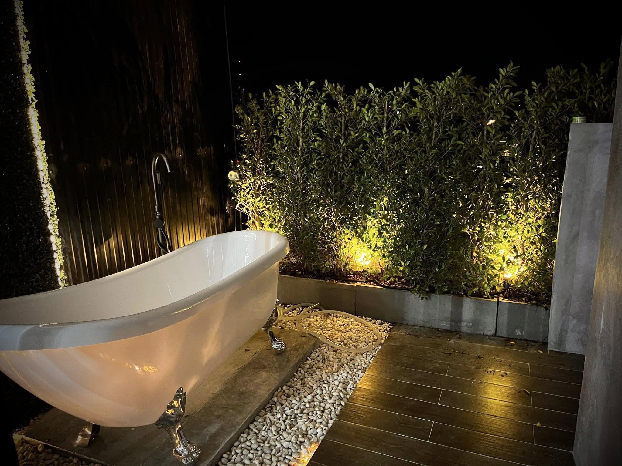 Outdoor bathtub and garden lighting